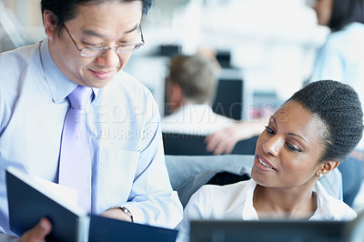 Buy stock photo Coaching, notebook and team with business people in office for account update, research and feedback. Bookkeeping, training and performance review with employees for discussion on budget report