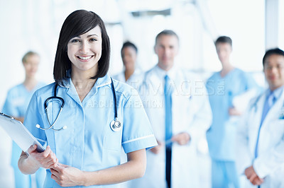 Buy stock photo Clipboard, portrait and smile with nurse in hospital for healthcare mission, solidarity and consulting. Medical, community and about us with people in clinic for support, doctors and collaboration