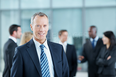 Buy stock photo Portrait, expo and mature with business man in conference for financial summit, coworkers and about us. Broker convention, workshop event and seminar with employee in lobby for tradeshow forum