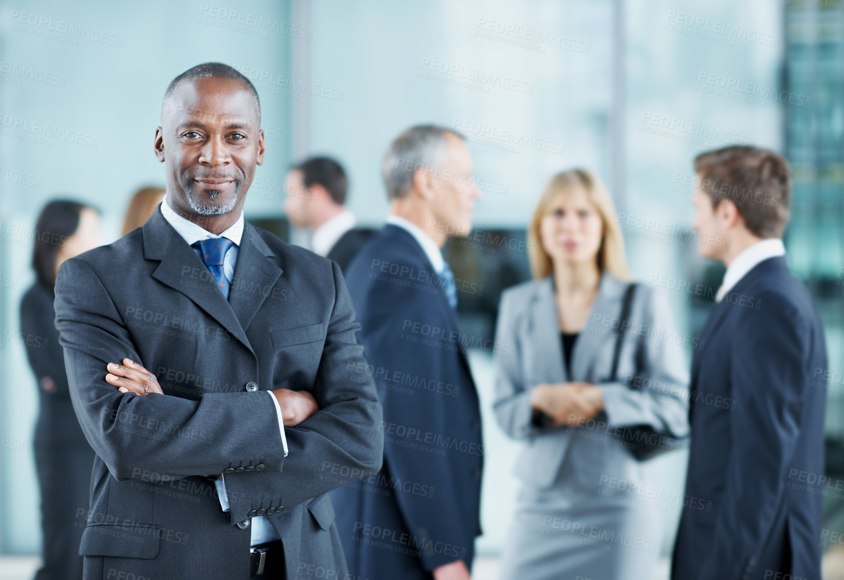 Buy stock photo Arms crossed, conference and portrait of business man in office for risk analysis event, expo and pride. Corporate summit, insurance broker workshop and about us with employees in lobby at seminar 