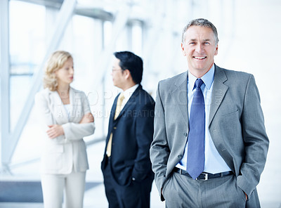 Buy stock photo Portrait, professional and seminar with business man as keynote speaker, broker expo or event. Trading expert, tradeshow and about us with mature employee at convention center for investor conference