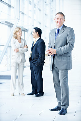 Buy stock photo Portrait, happy and conference with business man as keynote speaker, broker expo or event. Smile, coworkers or about us with mature employee at convention center for investor seminar and professional