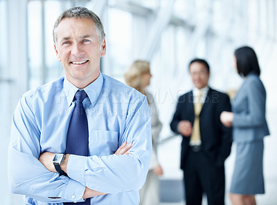 Buy stock photo Portrait, arms crossed and seminar with business man as keynote speaker, broker expo or smile. Happy, tradeshow and about us with mature employee at convention center for investor conference