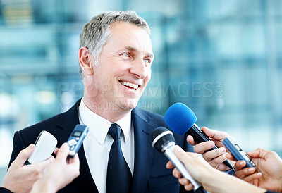 Buy stock photo Interview, senator and smile with man and microphone for journalist, political campaign and reporter. News broadcast, press conference success and government ambassador with mature person and happy