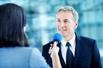 Buy stock photo Interview, journalist and question with man and microphone for senator, political campaign and reporter. News broadcast, press conference and government ambassador with mature person for election