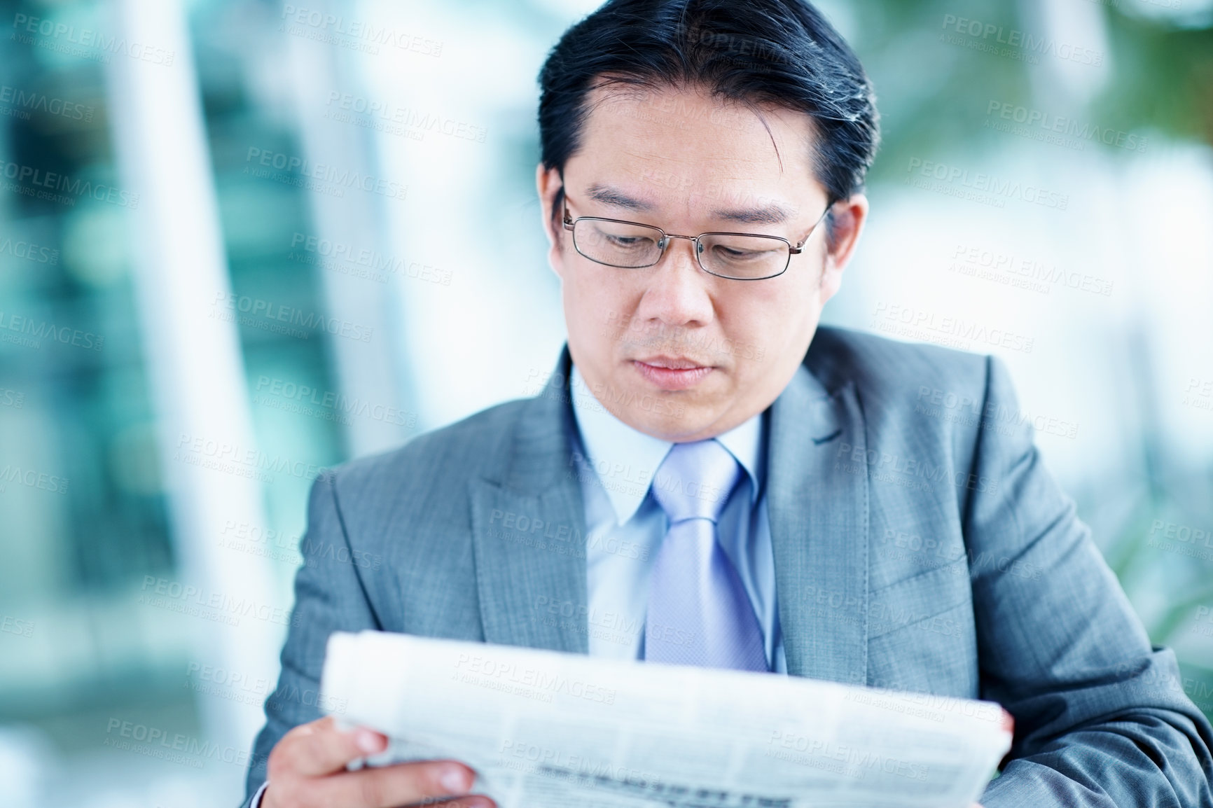 Buy stock photo Newspaper, reading and research with business asian man for stock market index, investment and article. Gdp growth, economic news and dividend yield with employee in agency for broker headlines