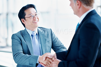 Buy stock photo Man, investor or handshake in office for deal, terms agreement or meeting for B2B opportunity. People, smile or shaking hands in agency for merger, investment collaboration or cooperation in business