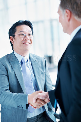 Buy stock photo Man, investor or handshake in business for partnership, terms agreement or meeting for B2B opportunity. People, smile or shaking hands in agency for merger, investment deal or cooperation in office