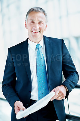 Buy stock photo Businessman, portrait and newspaper in office, professional and real estate auction news. Property development, mature person and daily paper with listing opportunity, happy or confident in workplace
