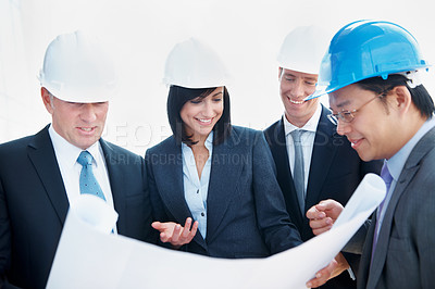 Buy stock photo Architect, smile and team with business people with blueprint for engineer, discussion and design. Construction project, building inspection and floor plan with employees for property developer