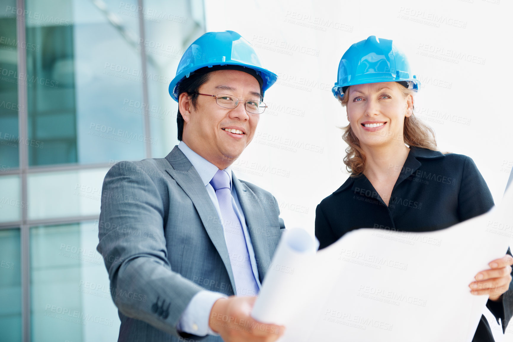 Buy stock photo Blueprint, engineer and portrait of business people in city for urban developer, architect and team. Construction layout, floor plan and designer with employees for meeting and project management