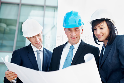Buy stock photo Blueprint, architect and meeting with business people in city for urban developer, engineer and smile. Construction layout, floor plan and designer with employees for reading and project management