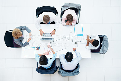 Buy stock photo Above, business and people in meeting in conference room, finance team and budget overview talk. Group, collaboration and paperwork with pc for financial planning, revenue and expenses chat in office