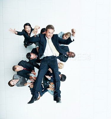 Buy stock photo Cheering, carrying and support with business man in office for winner, promotion or broker success. Achievement, investor profit and above with excited employees in lobby for bonus, space and holding