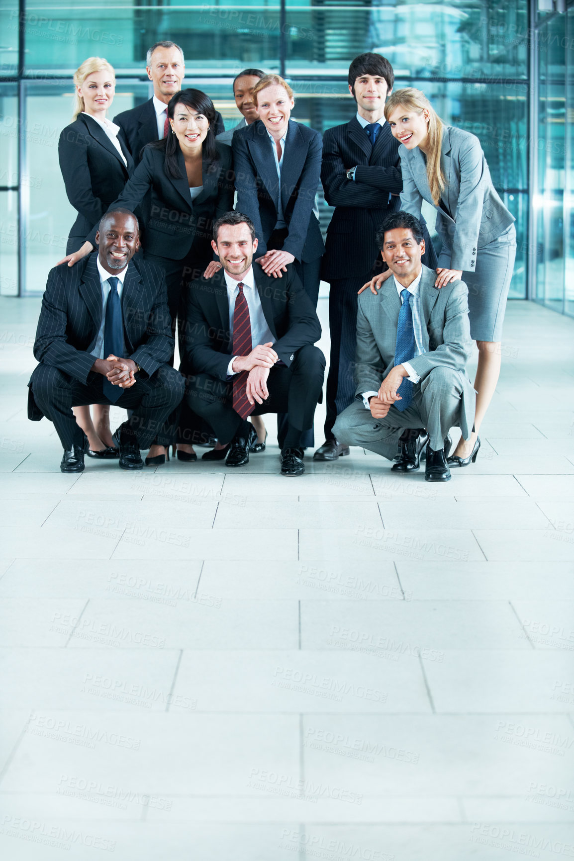 Buy stock photo Portrait, space and team with business people in huddle for community, solidarity or diversity. Synergy, support and partnership with group of employees in lobby for career, about us and mission