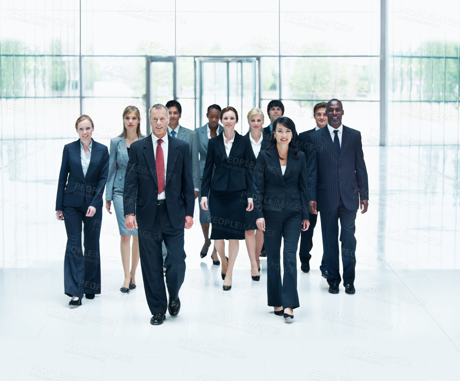 Buy stock photo Walking, team and portrait of business people at conference for networking expo, seminar and solidarity. Tradeshow event, corporate workshop and mission with employees in lobby for about us and forum