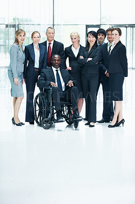Buy stock photo Portrait, wheelchair and team with business people at conference for diversity, solidarity or expo. Corporate seminar, tradeshow or partnership with employee in lobby for about us space and inclusion