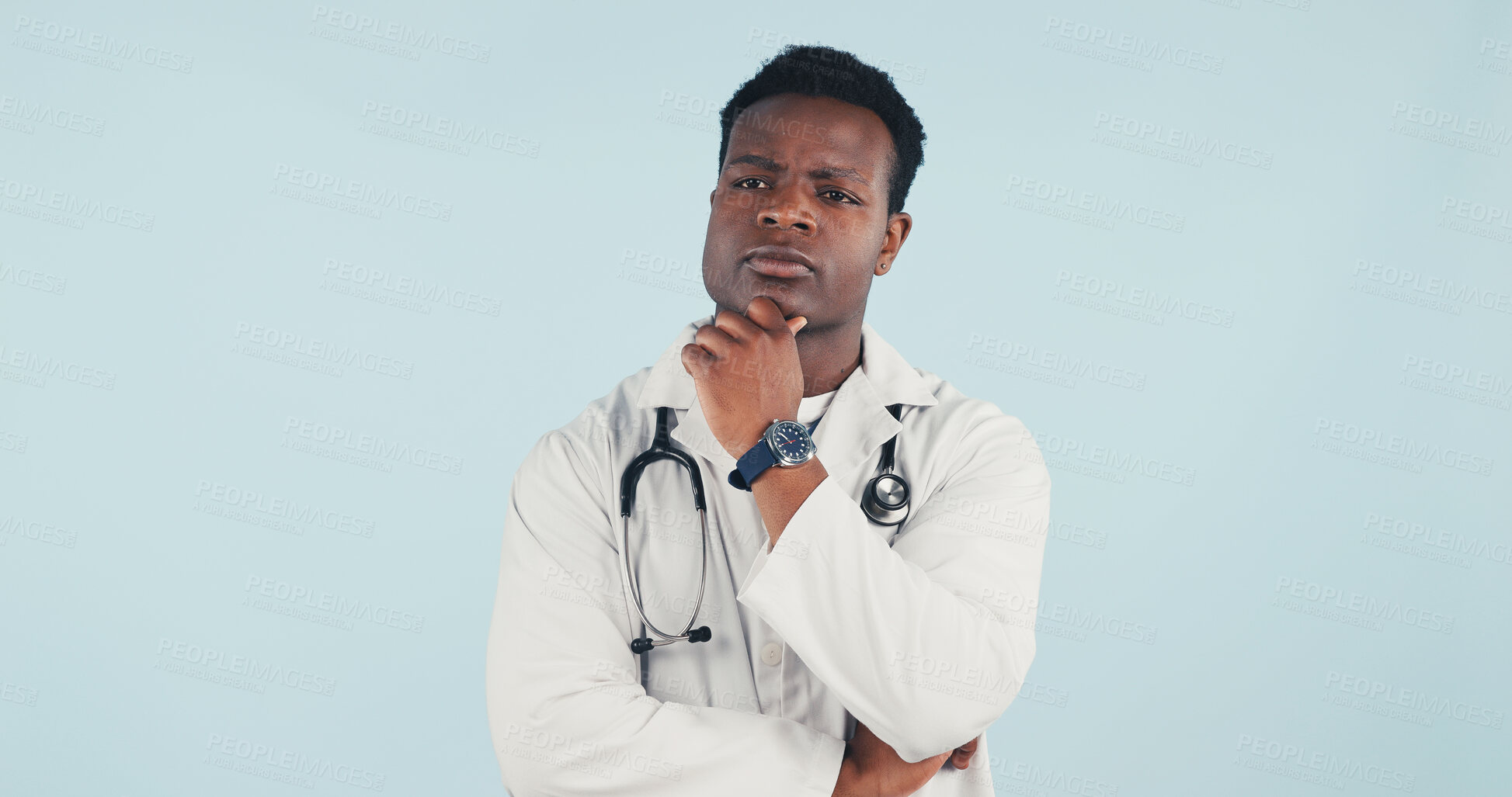 Buy stock photo Doctor, thinking or black man in studio for medical decision, idea or solution on a blue background. Thoughtful, male person or healthcare worker contemplating choice with option for health treatment