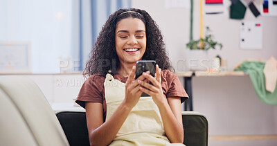 Buy stock photo Phone, smile and woman on sofa in house with texting, social media or networking on mobile app. Happy, relax and person with cellphone for reading blog on celebrity gossip in living room at home.