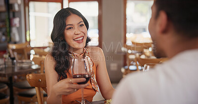 Buy stock photo Couple, wine and woman in restaurant for conversation, bonding and celebrate anniversary with drinks. Happy, fine dining and people with alcohol for romantic dinner, relationship and talking for love