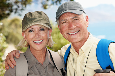 Buy stock photo Portrait of a happy senior couple standing outdoors