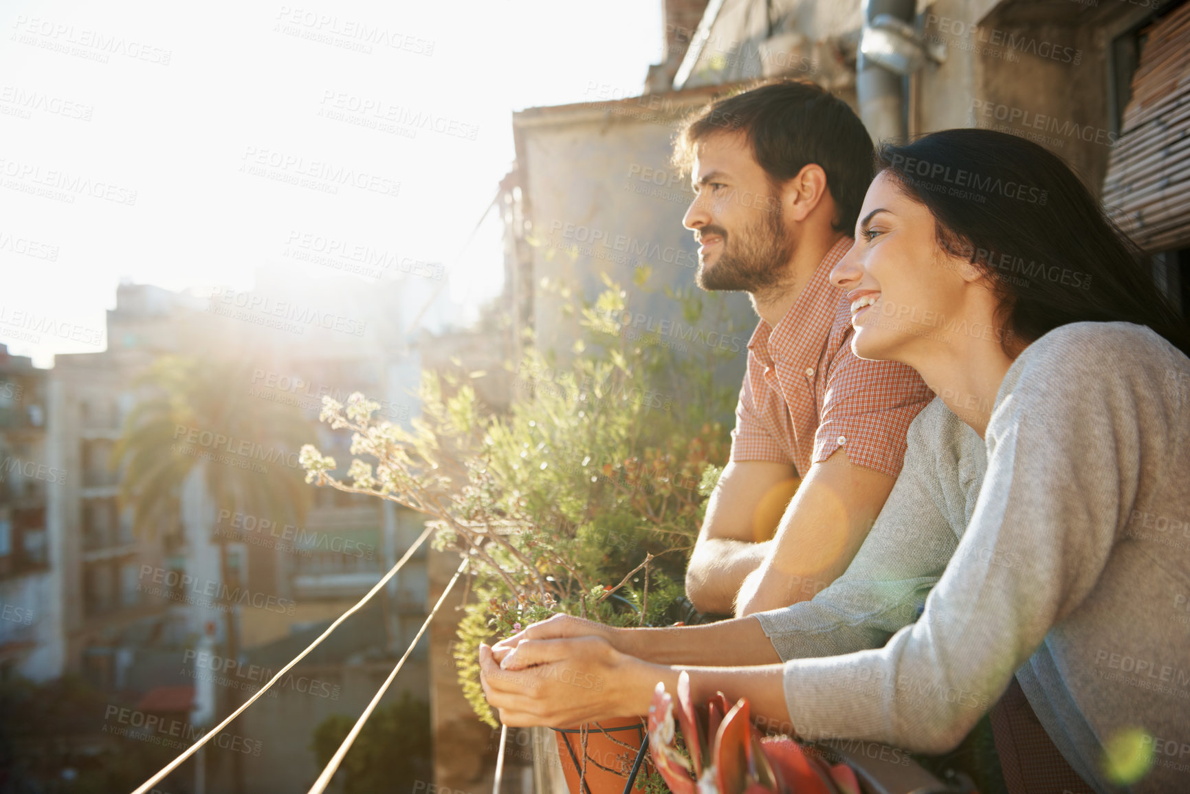 Buy stock photo Thinking, couple and smile at house on balcony, love and bonding together on calm morning. Happy, people and daydreaming on terrace for stress relief, affection and sightseeing view for weekend break