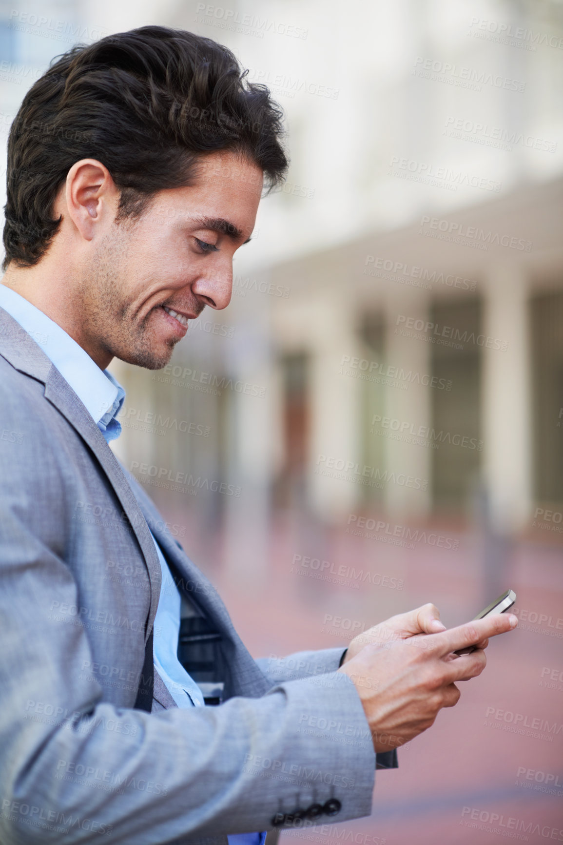 Buy stock photo Happy, businessman and typing with phone in city for social media, outdoor network or connection. Man, employee or user with smile on smartphone for online communication or chatting app in urban town
