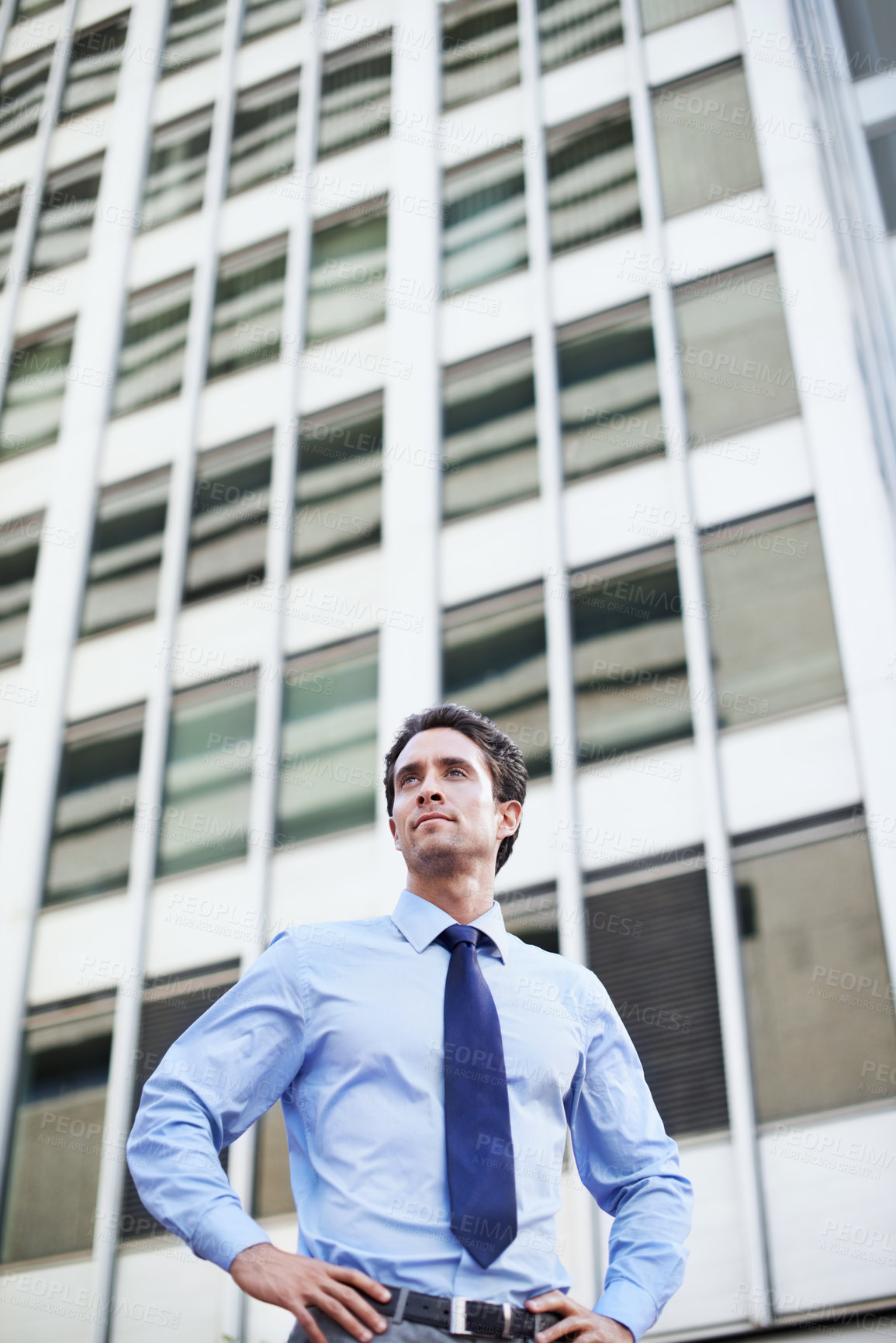 Buy stock photo Employee, thinking and man with pride in city, idea and planning for urban development and ambition. Outdoor, town planner and person with job opportunity, low angle and contemplating career decision