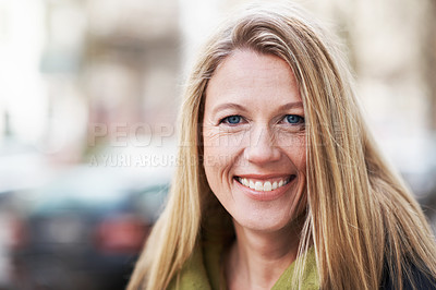 Buy stock photo Closeup of a blonde woman smiling at the camera