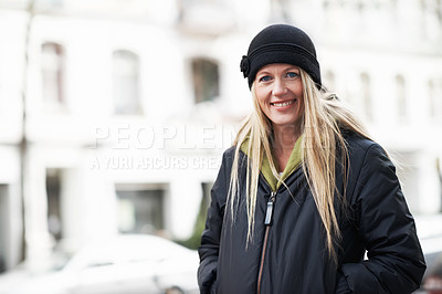 Buy stock photo Portrait of a smiling woman standing on the sidewalk with copyspace