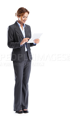 Buy stock photo Full length shot of a smiling businesswoman using a digital tablet while isolated on white