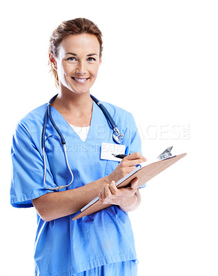 Buy stock photo An attractive female doctor writing on a clipboard while isolated on white