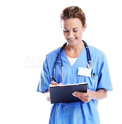 Buy stock photo An attractive female doctor writing on a clipboard while isolated on white