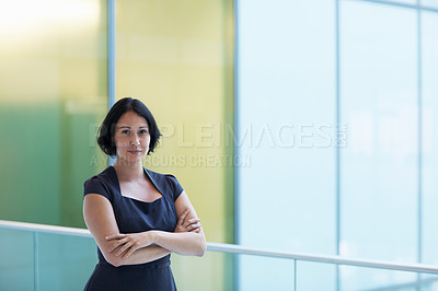 Buy stock photo Portrait of a confident young businesswoman in an office setting