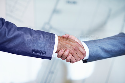 Buy stock photo Cropped closeup shot of two businessmen shaking hands