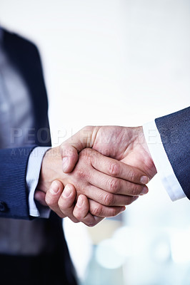 Buy stock photo Cropped closeup shot of two businessmen shaking hands