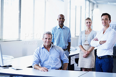 Buy stock photo Portrait of a diverse group of smiling coworkers standing in an office