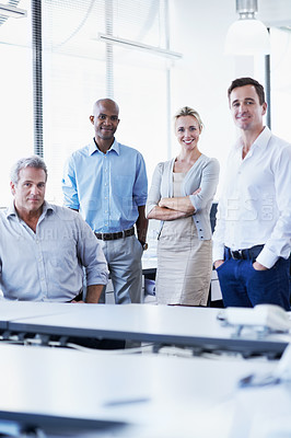 Buy stock photo Portrait of a diverse group of smiling businesspeople in an office