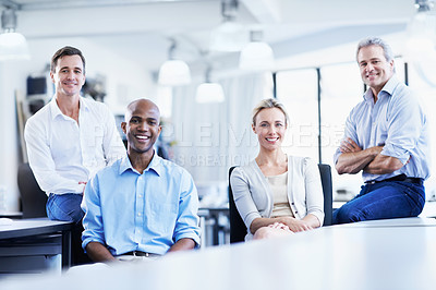 Buy stock photo Portrait of a diverse group of confident coworkers in an office