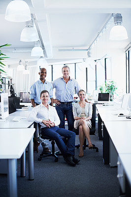 Buy stock photo Full length portrait of a diverse group of confident coworkers in an office