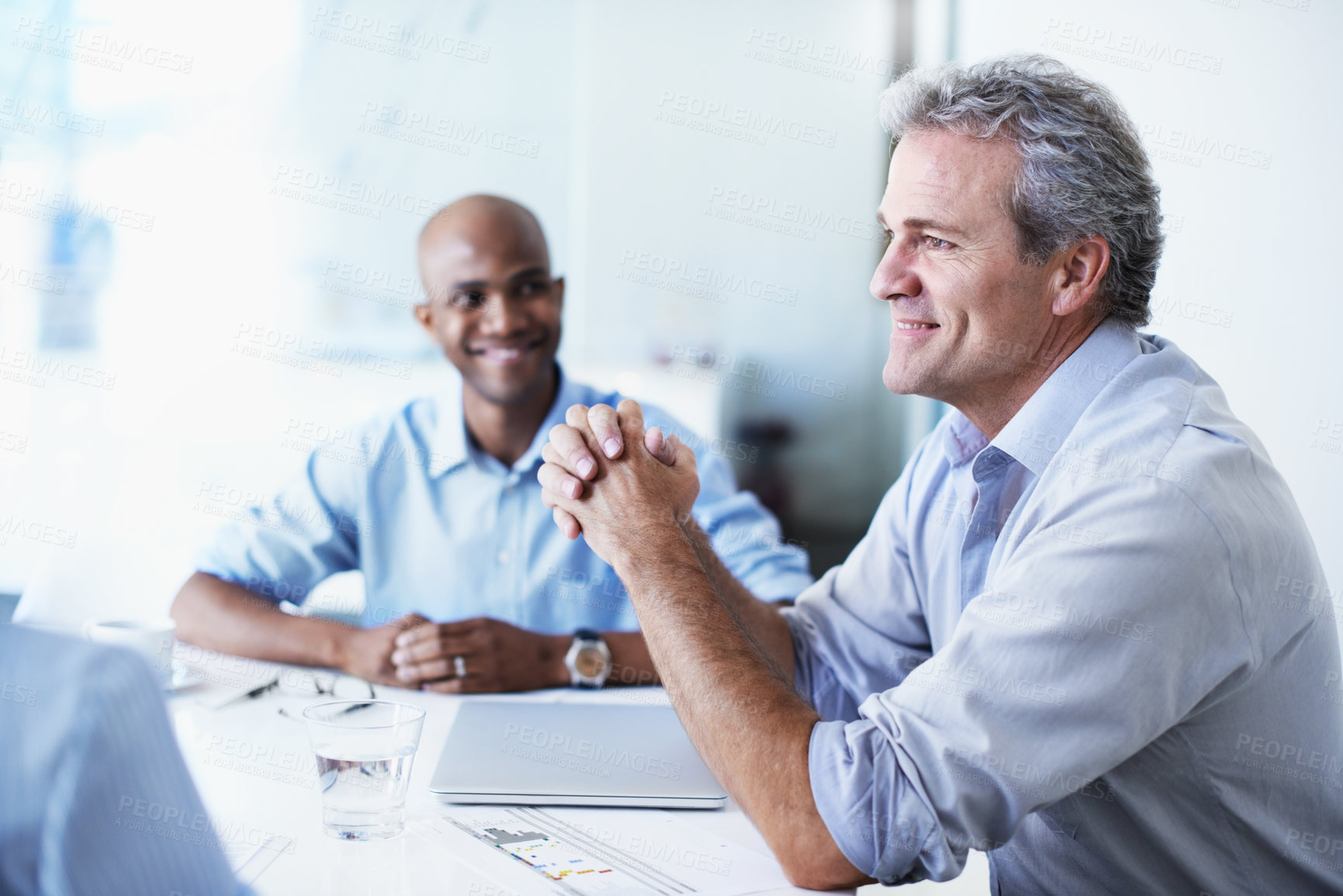 Buy stock photo Meeting, manager and smile with business man in office for risk assessment, discussion and review. Insurance claim, policy condition and collaboration with employees in agency for underwriter pitch