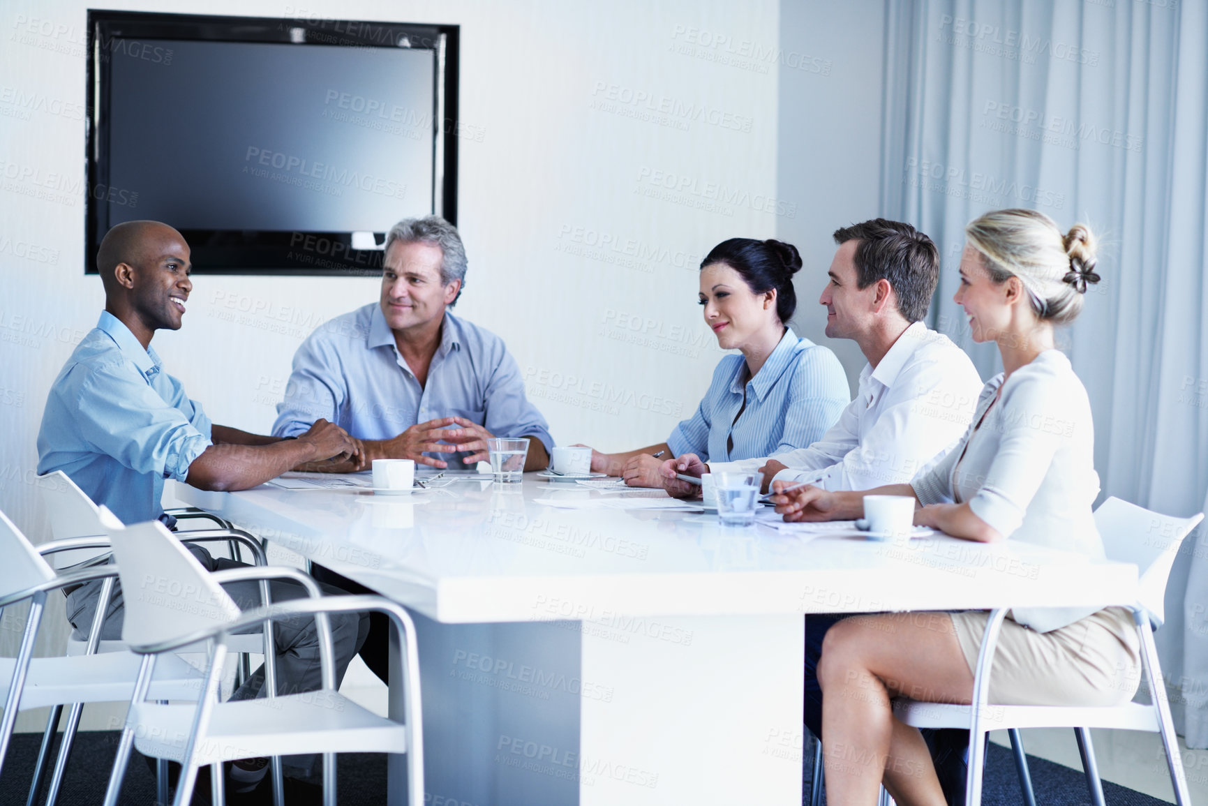 Buy stock photo Business, man and meeting discussion with team for merger plan, integration review and valuation. Stakeholders, happy and feedback in boardroom for market expansion, fairness opinion or presentation