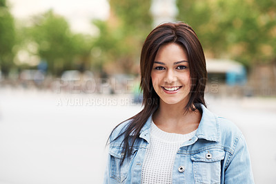 Buy stock photo Attractive young teen smiling and looking at the camera