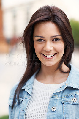 Buy stock photo Attractive young teen smiling and looking at the camera