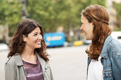 Buy stock photo Two young teen friends standing together happily while outdoors