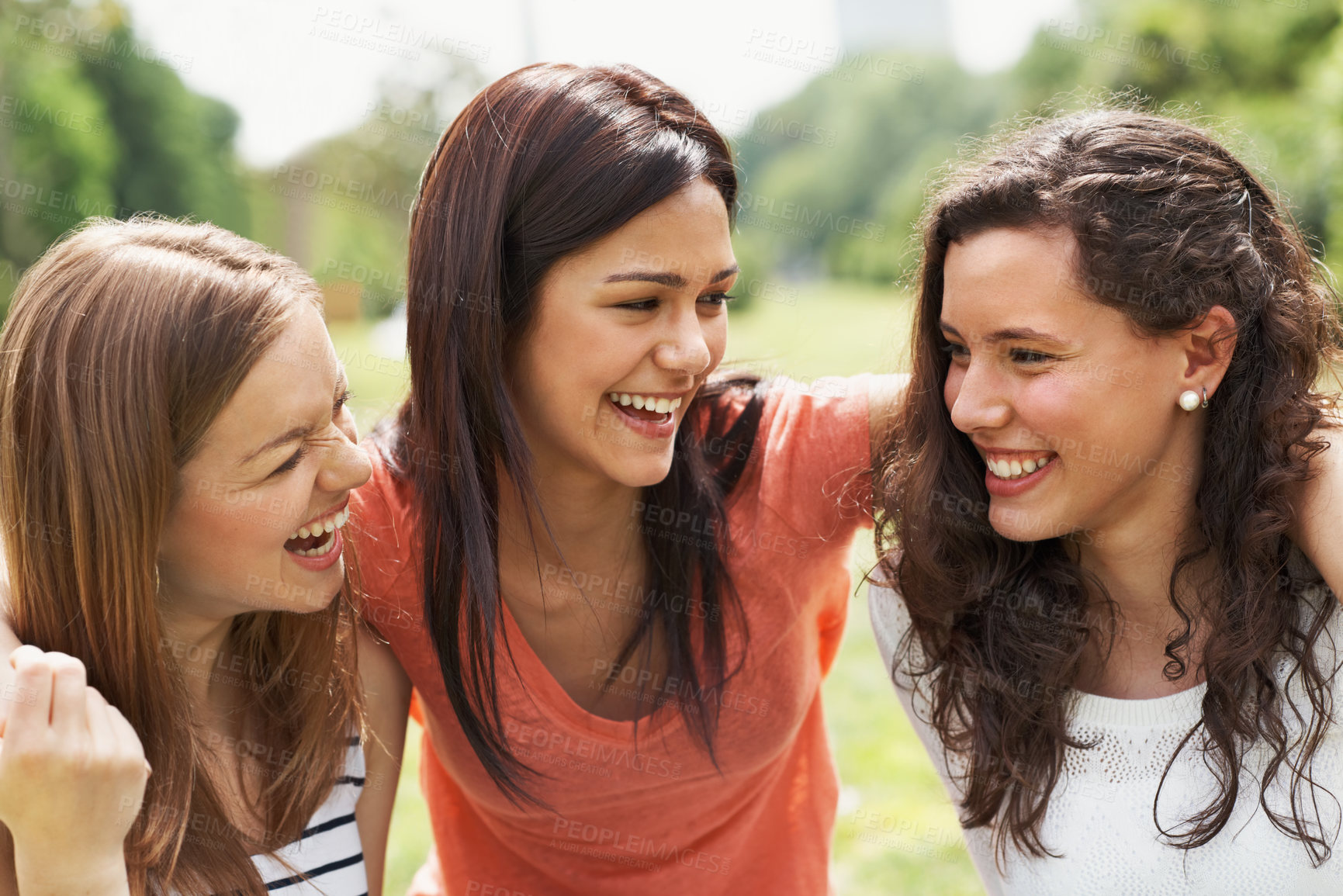Buy stock photo Laughing, happy and hug with friends in park for smile, summer vacation and bonding together. Relax, adventure and gen z hangout with women outdoor on weekend break for travel, tourism and holiday