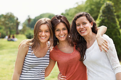 Buy stock photo Group of teen friends standing together and smiling while outdoors