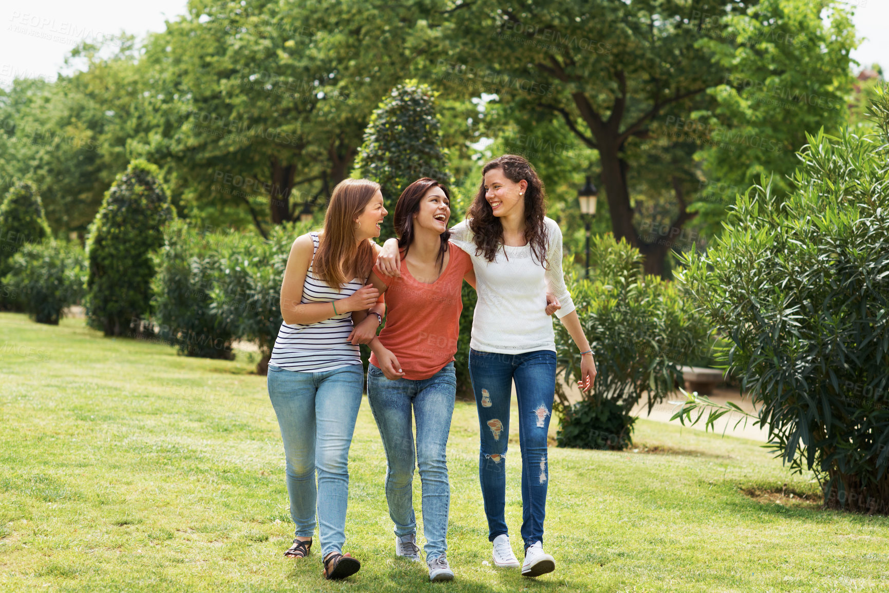 Buy stock photo Laugh, walk and support with friends in park for college break, summer vacation or bonding. Happy, weekend and university holiday with women outdoor for gen z hangout, funny and social gathering