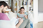 Enjoying the convenience of her e-reader