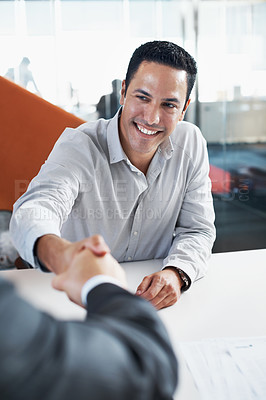 Buy stock photo Portrait of a businessman shaking hands with his coworker